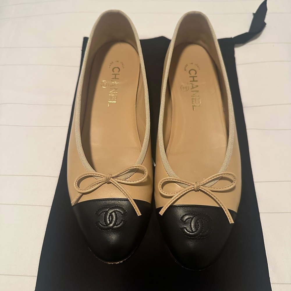 CHANEL Cream and Black Flats with Signature Bow